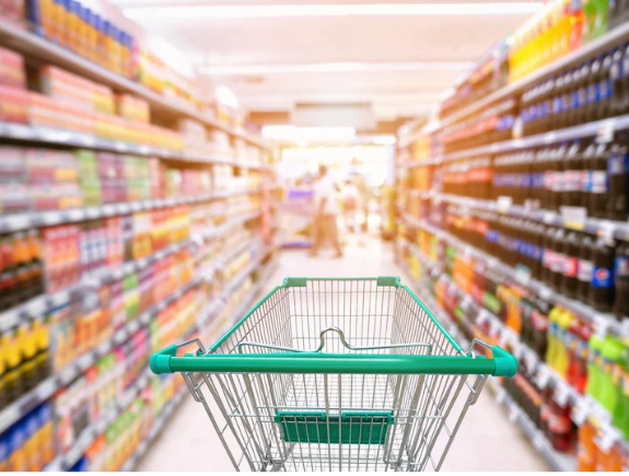 Shopping cart in a retail aisle